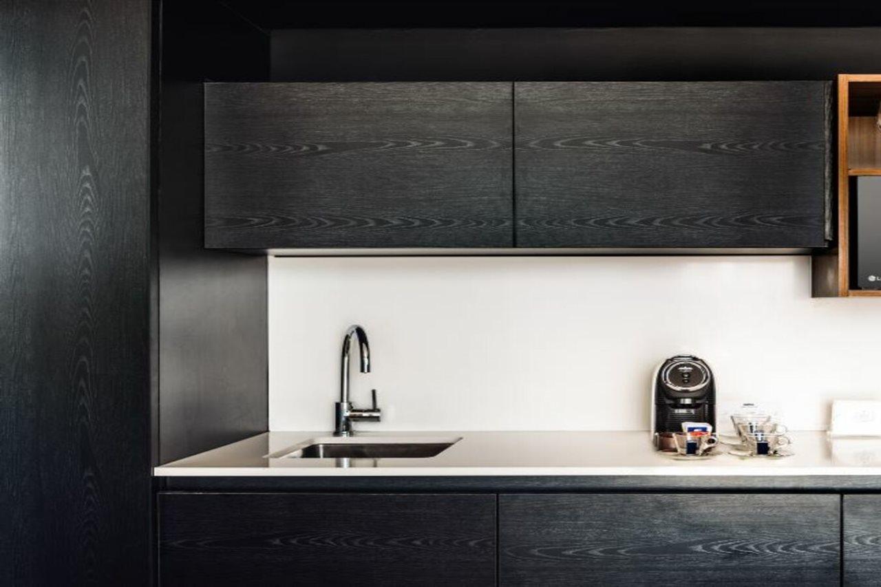 Sls Buenos Aires Puerto Madero Hotel Ngoại thất bức ảnh A kitchen in a serviced apartment