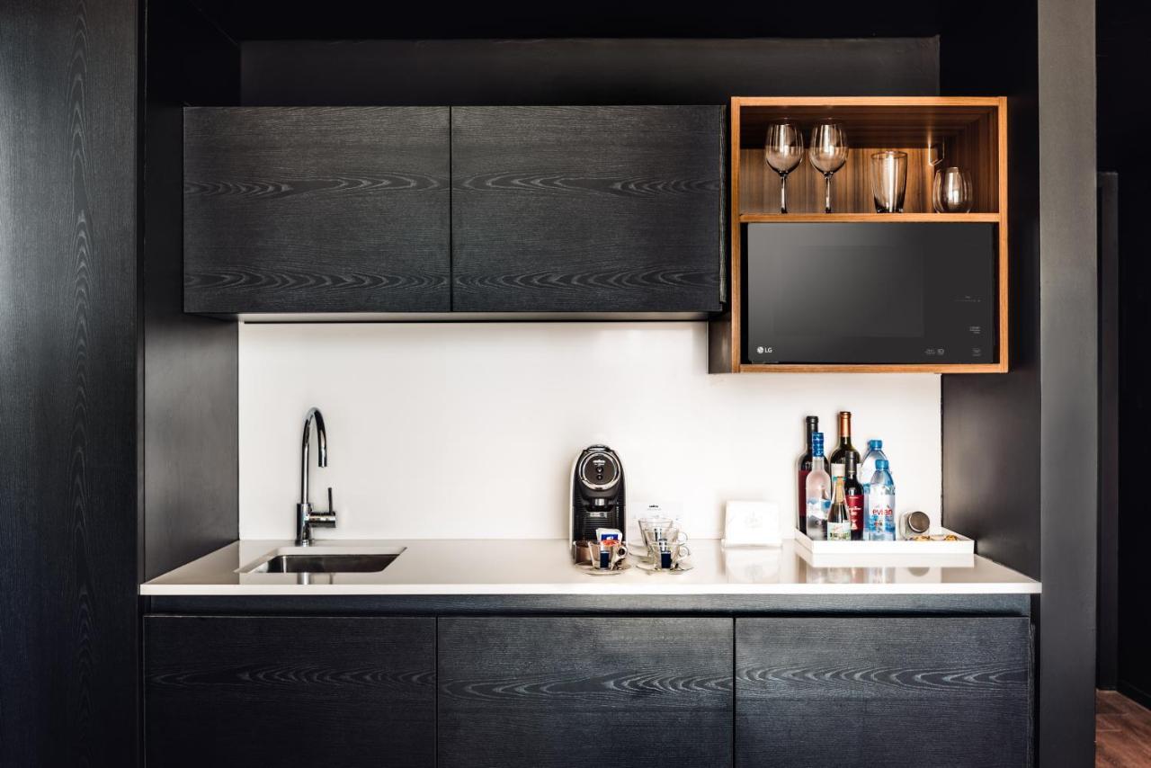 Sls Buenos Aires Puerto Madero Hotel Ngoại thất bức ảnh A wet bar in a hotel room