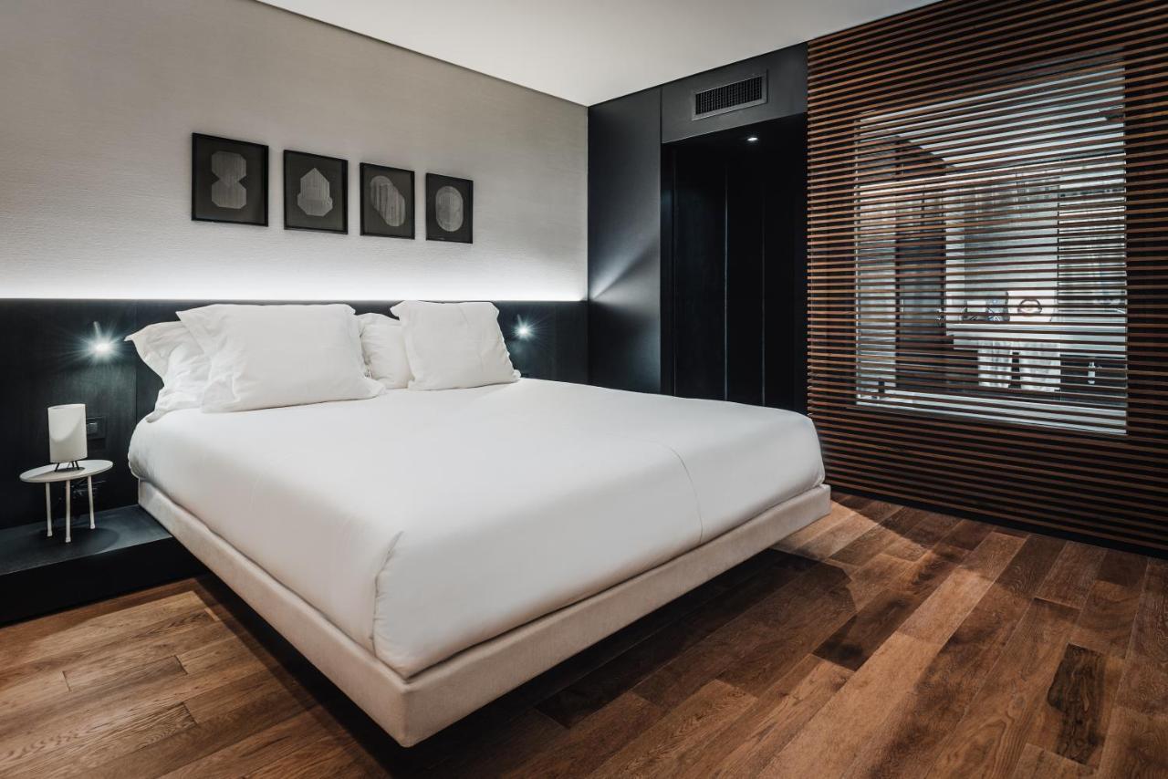 Sls Buenos Aires Puerto Madero Hotel Ngoại thất bức ảnh A bedroom at the hotel